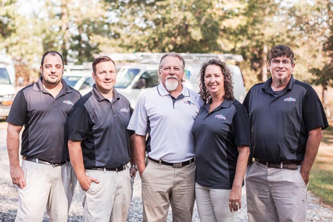 James White with his office staff members James White with his office staff members