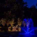 Fountain with blue light at night